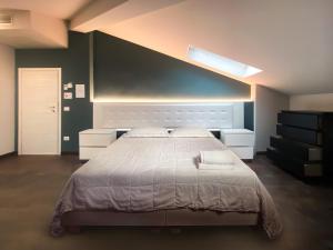 A bed or beds in a room at Le Stanze di Gianmarmo - Via di Mezzo