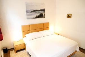 Posteľ alebo postele v izbe v ubytovaní «Go West» guest rooms