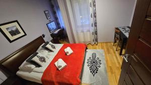 Posteľ alebo postele v izbe v ubytovaní Apartament Bystra Woda 28 z garażem
