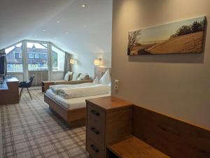 Postel nebo postele na pokoji v ubytování Hotel Germania + 37 fotografií