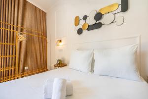 Cama ou camas em um quarto em Goa Square by Lisbon with Sintra