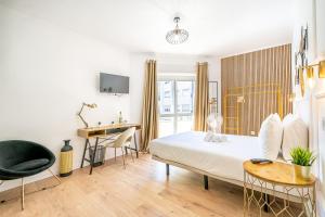 Cama ou camas em um quarto em Goa Square by Lisbon with Sintra
