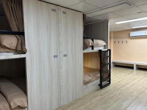 Postel nebo postele na pokoji v ubytování OD Hostel