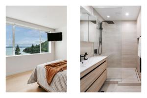 baño con cama, lavabo y ventana en Panorama Penthouse Luxe Ocean Views & Pool, en Mount Maunganui 25 fotos más