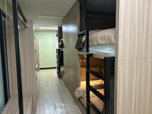 Postel nebo postele na pokoji v ubytování OD Hostel