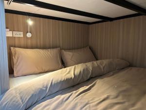 Postel nebo postele na pokoji v ubytování OD Hostel
