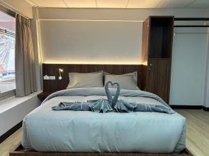 Postel nebo postele na pokoji v ubytování OD Hostel