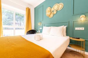 Cama ou camas em um quarto em Goa Square by Lisbon with Sintra
