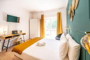 Cama ou camas em um quarto em Goa Square by Lisbon with Sintra