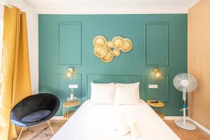 Cama ou camas em um quarto em Goa Square by Lisbon with Sintra
