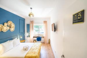 Cama ou camas em um quarto em Goa Square by Lisbon with Sintra