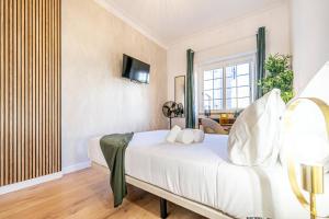 Cama ou camas em um quarto em Goa Square by Lisbon with Sintra