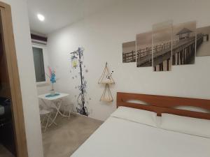 Postel nebo postele na pokoji v ubytování B&B il MENHIR