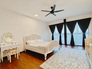 Postel nebo postele na pokoji v ubytování Larkin Bungalow Homestay + 15 fotografií