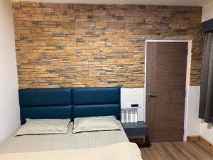 Postel nebo postele na pokoji v ubytování Norbu Thungkar Homestay