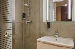 Koupelna v ubytování Leonardo Boutique Hotel Munich