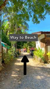 a way to beach sign on a road at Second Pad at Second floor in Bolinao