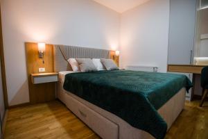 Postel nebo postele na pokoji v ubytování TOP VIEW apartment 40