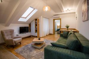TV a/nebo společenská místnost v ubytování TOP VIEW apartment 40