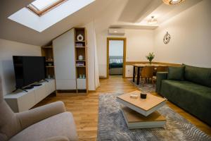 TV a/nebo společenská místnost v ubytování TOP VIEW apartment 40