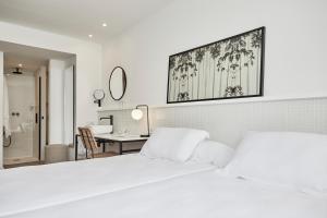 A bed or beds in a room at HM Dunas Blancas