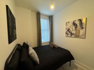 Μια τηλεόραση ή/και κέντρο ψυχαγωγίας στο Park Apartment 1, close to Tynemouth