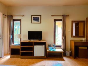 TV a/nebo společenská místnost v ubytování Sunda Resort