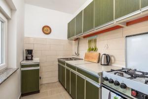 Kuchyň nebo kuchyňský kout v ubytování Apartments Masa