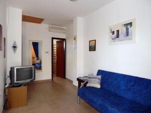 TV a/nebo společenská místnost v ubytování Apartments Masa