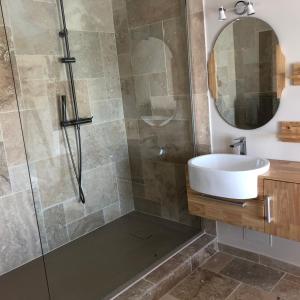 a bathroom with a shower and a sink at Grand Mas in Tarascon
