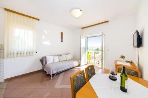 Postel nebo postele na pokoji v ubytování Apartments Cloe