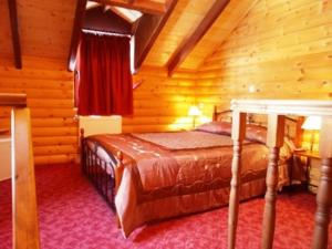 Postel nebo postele na pokoji v ubytování Stivakti Chalet