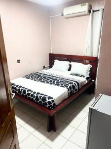 Postel nebo postele na pokoji v ubytování Makepe Villa + 2 fotografie