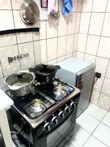 Kuchyň nebo kuchyňský kout v ubytování Makepe Villa