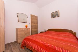 Posteľ alebo postele v izbe v ubytovaní Apartment Tamara + 9 fotografií