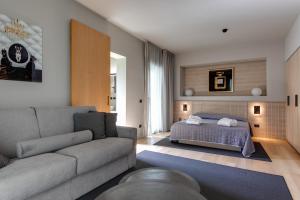 Posteľ alebo postele v izbe v ubytovaní Mima Aparthotel Boutique & Spa