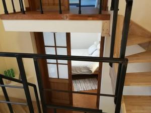 a room with a bunk bed in a room at Triplex près de la Grand-Place in Brussels