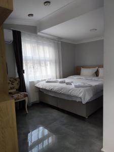 Postel nebo postele na pokoji v ubytování moonlight hotel