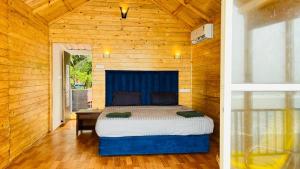 Postel nebo postele na pokoji v ubytování Sameer beachfront Cottages