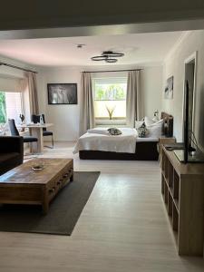 Postel nebo postele na pokoji v ubytování Garni Hotel & Appartements Nordstrand