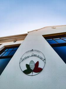 a sign on the side of a building at Capelands Resort, Italian Restaurant & Winery in Cape Town +37 photos