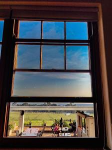 a view from a window of a room with a view at Capelands Resort, Italian Restaurant & Winery in Cape Town