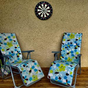 Posezení v ubytování Appartement dans un ecrin de verdure terrasse privee
