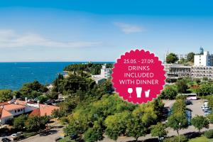 a large red sign that reads drinks included with dinner at Hotel Istra Plava Laguna in Poreč