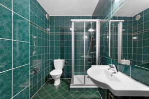 Koupelna v ubytování Hotel Franz