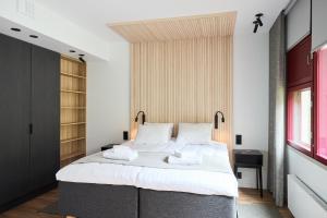 Ein Bett oder Betten in einem Zimmer der Unterkunft Hotel Linnasmäki