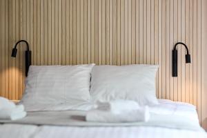 Ein Bett oder Betten in einem Zimmer der Unterkunft Hotel Linnasmäki