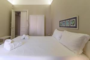 A bed or beds in a room at Felt in love in Catania