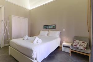 A bed or beds in a room at Felt in love in Catania
