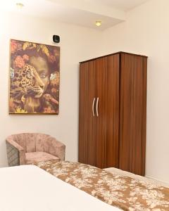 Kama o mga kama sa kuwarto sa Proof Hotel Lekki